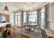 Charming breakfast nook featuring bay windows with decorative drapes that bathes the dining area in natural light at 10327 Oak Pond Cir, Charlotte, NC 28277