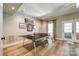 Game room with a ping pong table, recessed lights, and access to the outdoors through a glass door at 10327 Oak Pond Cir, Charlotte, NC 28277