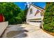 Spacious three-car garage with an American flag, offering ample parking and storage with convenient access to the home at 10327 Oak Pond Cir, Charlotte, NC 28277