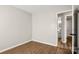A bedroom with new laminate flooring and freshly painted neutral walls at 104 Berry St, Fort Mill, SC 29715