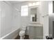 Clean bathroom with a white tiled shower and tub combination, vanity with marble top at 11000 Strike The Gold Ln, Waxhaw, NC 28173