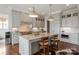 Gourmet kitchen with island, stainless steel appliances, and custom cabinetry at 11000 Strike The Gold Ln, Waxhaw, NC 28173