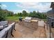 Built-in outdoor kitchen with grill and stone counters, perfect for entertaining at 11000 Strike The Gold Ln, Waxhaw, NC 28173