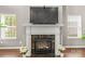 Close-up of the fireplace with a marble surround and decorative accents at 111 Tilton Dr, Mooresville, NC 28115