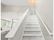 Staircase with white railings and carpeted steps leading to the upper level at 111 Tilton Dr, Mooresville, NC 28115
