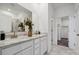 Bright bathroom featuring double sink vanity, with marble countertop, and walk-in closet at 1113 Hallman Branch Ln, Lincolnton, NC 28092