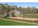 Playground with swings, slide, and climbing structures in the community at 1113 Hallman Branch Ln, Lincolnton, NC 28092