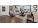 Cozy living room with a modern fireplace, a comfortable sofa, and stylish decor for relaxing or entertaining guests at 1113 Hallman Branch Ln, Lincolnton, NC 28092