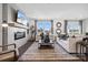 Spacious living room featuring a fireplace, comfortable seating, large windows, and stylish decor at 1113 Hallman Branch Ln, Lincolnton, NC 28092