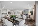 Open living space integrating kitchen, dining, and living areas, showcasing modern design and comfortable living at 1113 Hallman Branch Ln, Lincolnton, NC 28092