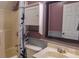 This bathroom features a combination tub and shower, toilet, vanity with sink and medicine cabinet at 12601 Guardhouse Ct, Charlotte, NC 28262