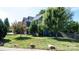 Beautiful two-story home featuring blue siding and a well-manicured lawn with mature trees at 12601 Guardhouse Ct, Charlotte, NC 28262