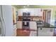 Well-equipped kitchen featuring stainless steel appliances, ample cabinetry, and modern fixtures at 12601 Guardhouse Ct, Charlotte, NC 28262