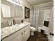 Well-lit bathroom with granite countertop, and stylish decor at 169 Freeze Nw Ave, Concord, NC 28025