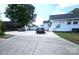 Wide driveway with parking space for multiple cars leading up to the rear of the house at 169 Freeze Nw Ave, Concord, NC 28025