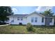Exterior showcasing the home's siding, roof, and backyard, complete with a modern AC unit at 169 Freeze Nw Ave, Concord, NC 28025