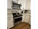 Updated kitchen featuring stainless steel appliances and granite counters at 169 Freeze Nw Ave, Concord, NC 28025
