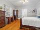Sunlit bedroom with hardwood floors, light grey walls, and traditional furniture at 170 8Th Ave, Cramerton, NC 28032