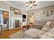 Cozy living room showcasing a beautiful fireplace and mantle, complemented by stylish decor and ample seating at 170 8Th Ave, Cramerton, NC 28032