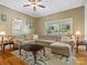 Inviting living room featuring a large sectional sofa, perfect for entertaining and relaxing at 170 8Th Ave, Cramerton, NC 28032