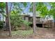 Lush backyard featuring a wooden deck, perfect for enjoying the natural surroundings and outdoor relaxation at 18 Shipmaster Ct, Clover, SC 29710