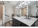 Bathroom featuring double sink vanity, marble countertop, and tiled walk-in shower at 18 Shipmaster Ct, Clover, SC 29710