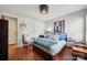 Cozy bedroom featuring stylish decor, hardwood floors, and a large window at 18 Shipmaster Ct, Clover, SC 29710