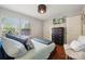 Comfortable bedroom featuring natural light, sleek wood floors, closet and stylish furniture at 18 Shipmaster Ct, Clover, SC 29710