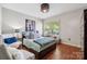 Bedroom featuring hardwood floors, natural light, and stylish decor at 18 Shipmaster Ct, Clover, SC 29710