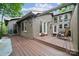 Relaxing back deck area perfect for outdoor entertaining, featuring a built-in pergola and lounge seating at 18 Shipmaster Ct, Clover, SC 29710