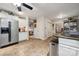 Bright kitchen with stainless steel appliances, tiled floors, and white cabinetry at 18 Shipmaster Ct, Clover, SC 29710