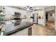 Well-equipped kitchen with white cabinets, dark countertops, and stainless steel appliances at 18 Shipmaster Ct, Clover, SC 29710