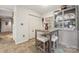 Kitchen eating area showcasing built-in cabinet and tile flooring at 18 Shipmaster Ct, Clover, SC 29710