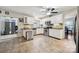 Bright kitchen with white cabinets, tile backsplash, and stainless steel appliances at 18 Shipmaster Ct, Clover, SC 29710
