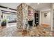 Inviting living room showcasing a floor-to-ceiling stone fireplace and stylish flooring at 18 Shipmaster Ct, Clover, SC 29710