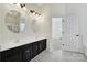This bathroom features dual sinks, tile floors, and a tub/shower combo at 1855 Second Baxter Xing, Fort Mill, SC 29708