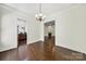 Open dining room is adjacent to both the kitchen and the formal living room at 1855 Second Baxter Xing, Fort Mill, SC 29708