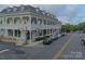 Charming two-story commercial building with classic architectural details and street parking at 1855 Second Baxter Xing, Fort Mill, SC 29708