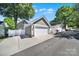 Detached two-car garage with wide driveway and well-maintained exterior at 1855 Second Baxter Xing, Fort Mill, SC 29708