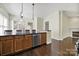 Kitchen with stainless steel appliances, granite countertops, and a breakfast bar with seating at 1855 Second Baxter Xing, Fort Mill, SC 29708