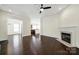 Spacious living room with fireplace and dark hardwood floors at 1855 Second Baxter Xing, Fort Mill, SC 29708