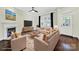 Bright living room featuring a fireplace, large window, and stylish decor at 1855 Second Baxter Xing, Fort Mill, SC 29708