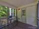 Enjoy the outdoors from this charming screened porch, perfect for relaxation and privacy at 1904 Lark Ln, Stanley, NC 28164