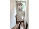 View of the staircase and entry with a decorative chandelier and natural light at 1904 Lark Ln, Stanley, NC 28164