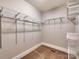 Spacious walk-in closet with metal shelving, providing ample storage space at 1904 Lark Ln, Stanley, NC 28164