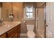 Bathroom featuring a single sink vanity, toilet, and shower-tub combination at 2101 Congress Ct, Kannapolis, NC 28083