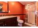 Bathroom featuring granite countertop vanity, toilet and glass shower at 2101 Congress Ct, Kannapolis, NC 28083