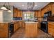 Well-equipped kitchen with granite countertops, center island, and modern appliances at 2101 Congress Ct, Kannapolis, NC 28083