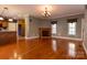 Spacious living room with hardwood floors, fireplace, and ample natural light at 2101 Congress Ct, Kannapolis, NC 28083