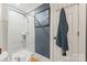 This bathroom features neutral paint, a tiled shower, and modern fixtures at 222 N Weldon St, Gastonia, NC 28052